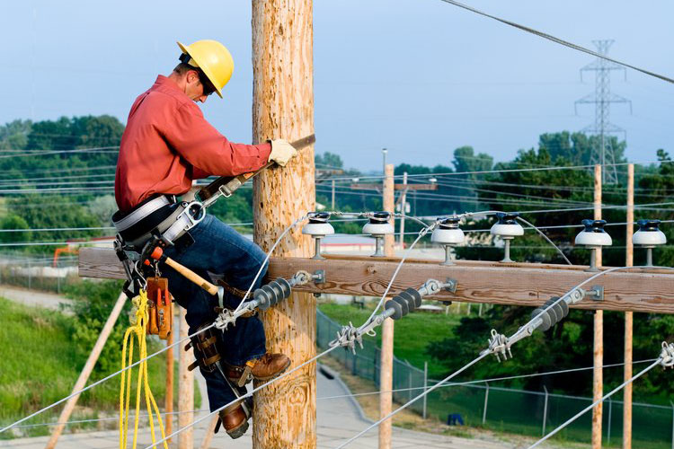Man working on an electrical line